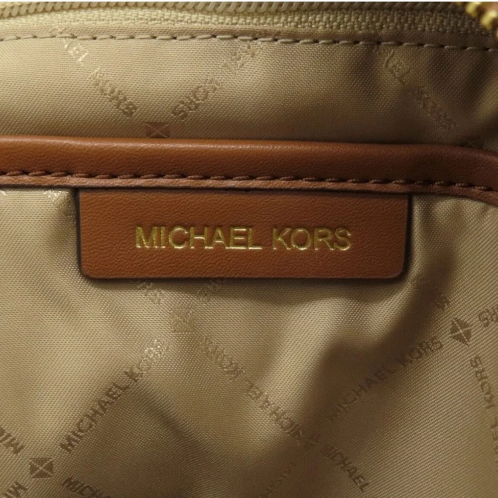 Michael Kors Brown Backpack with Aspen patches sherpa detail like new (RARE)